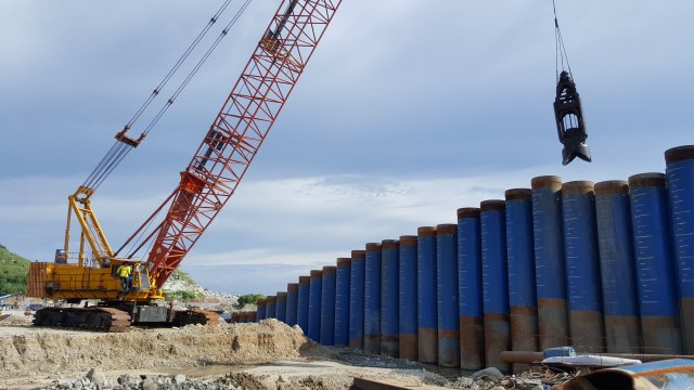 Excavation inside tubular piles using grab hammer